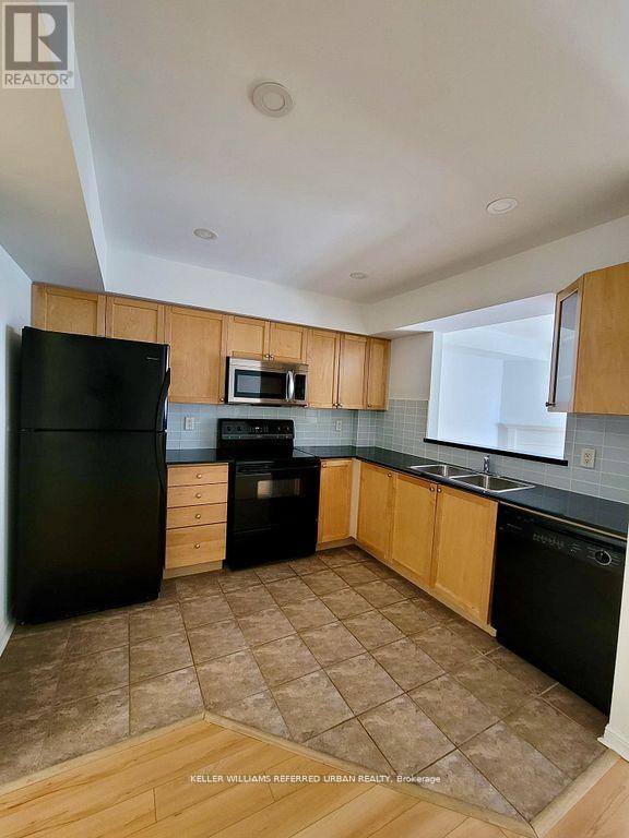 344 - 3 Everson Drive, Toronto, ON - Indoor Photo Showing Kitchen With Double Sink