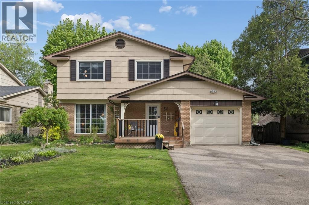 Two-story residence featuring a brick and siding exterior - 50 Lewis Crescent, Kitchener, ON - Outdoor