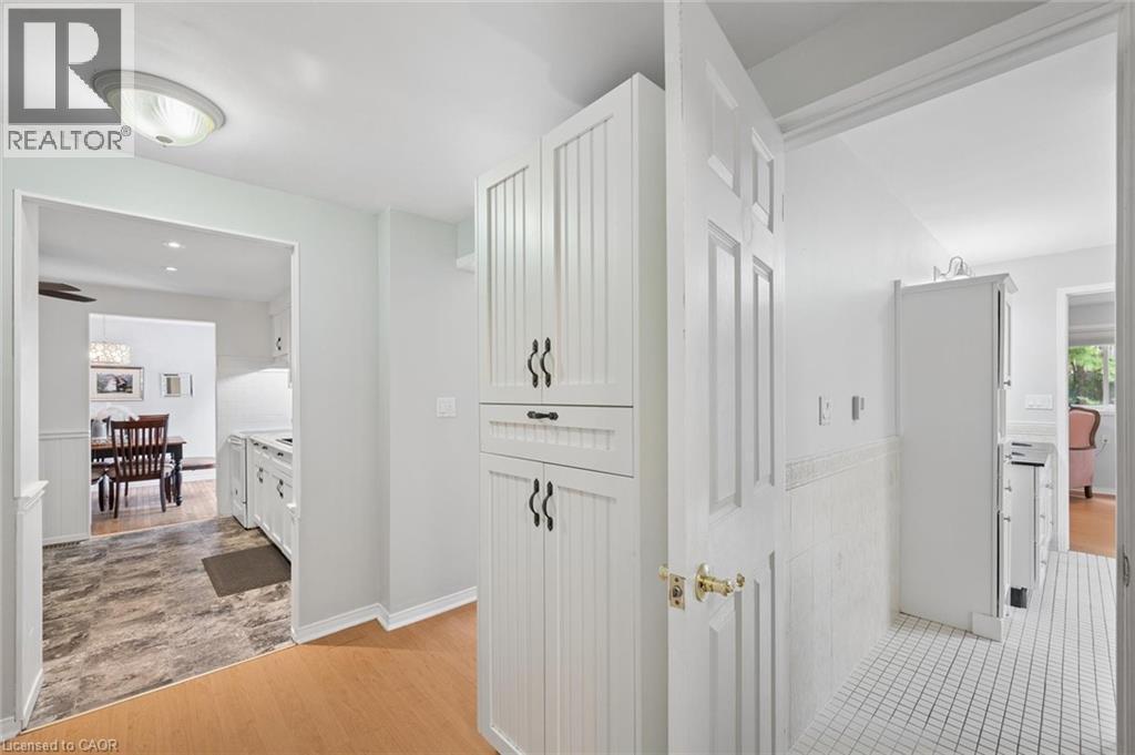 Hallway with wood-finish flooring and light wall colors - 50 Lewis Crescent, Kitchener, ON - Indoor Photo Showing Other Room