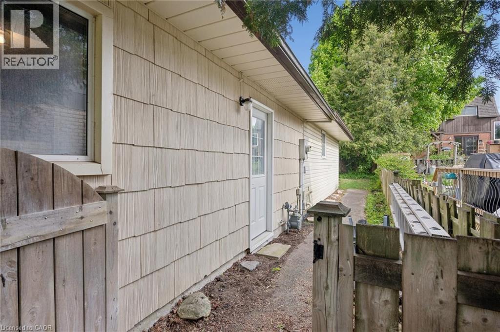 Exterior wall with horizontal siding and a white window frame - 50 Lewis Crescent, Kitchener, ON - Outdoor With Exterior