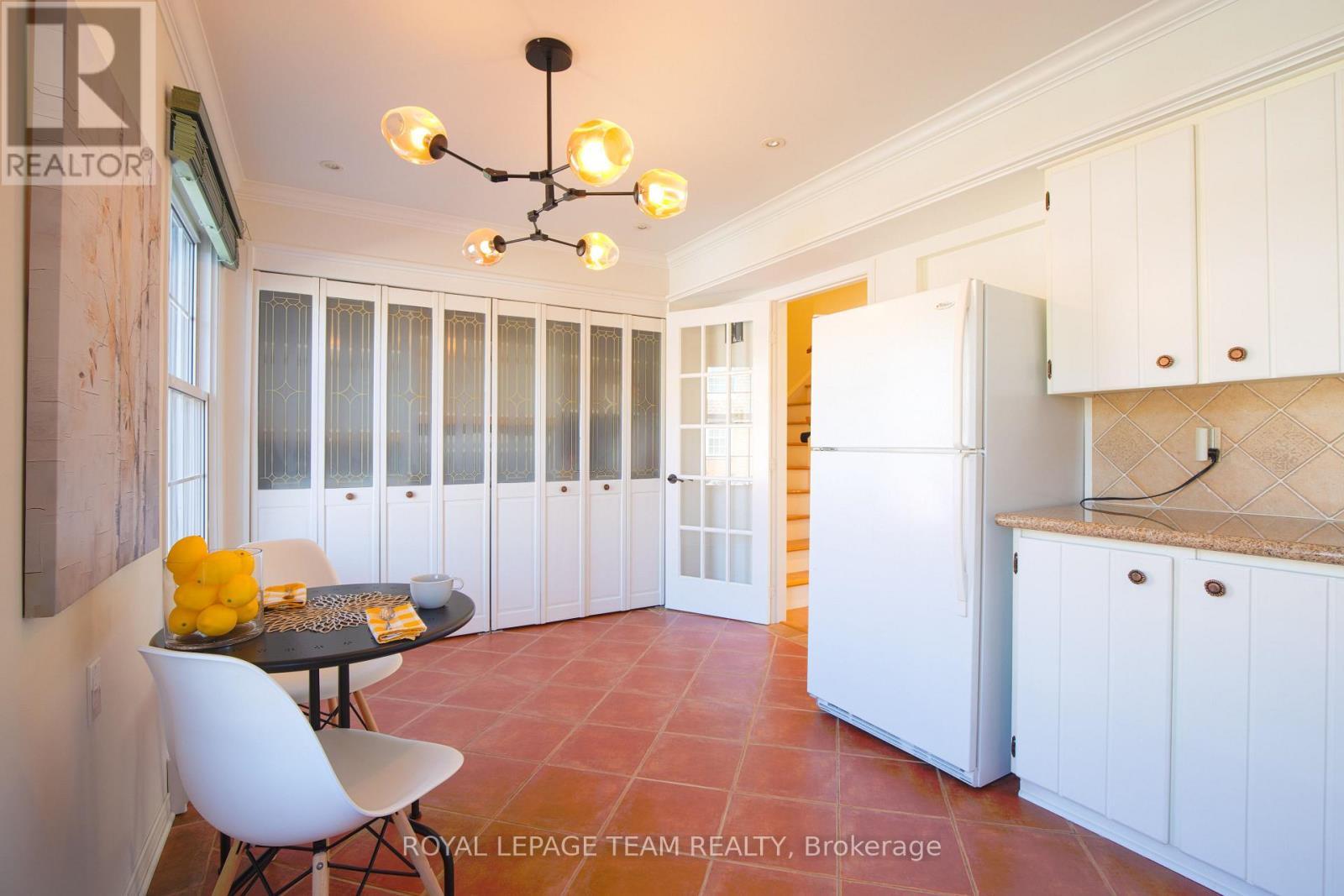 Kitchen also houses laundry facilities - 8 Moorside Private, Ottawa, ON - Indoor Photo Showing Other Room
