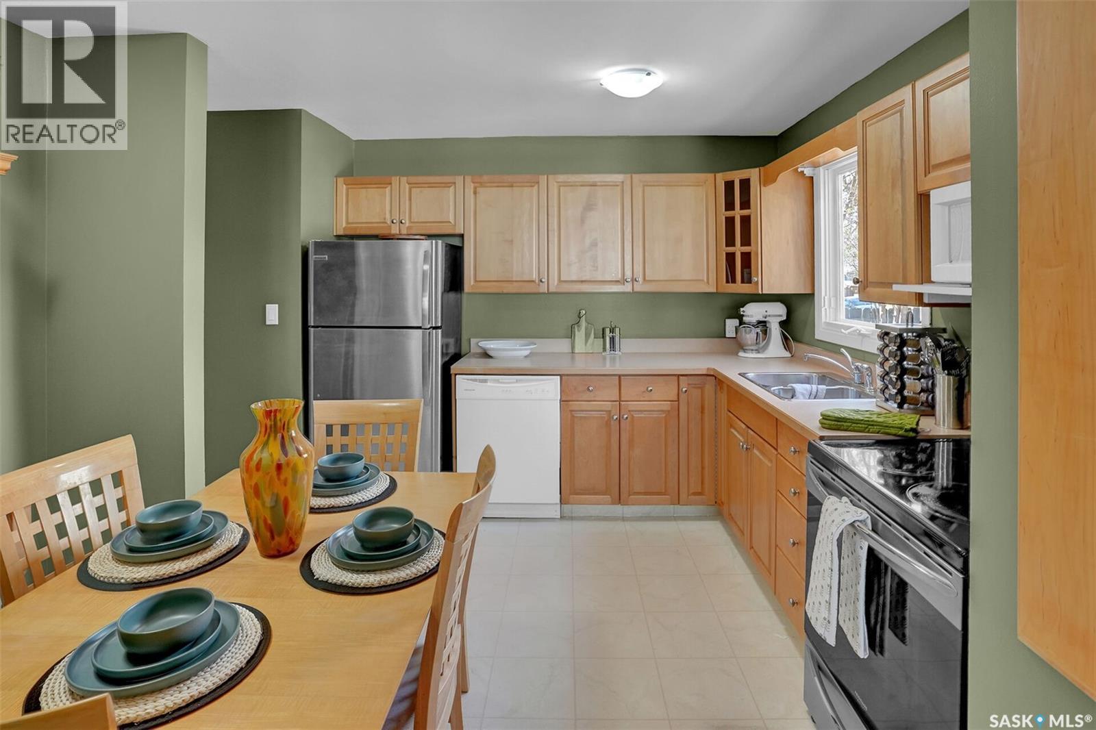 23 Hind Street, Regina, SK - Indoor Photo Showing Kitchen With Double Sink