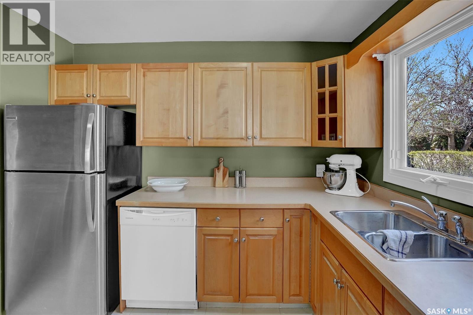 23 Hind Street, Regina, SK - Indoor Photo Showing Kitchen With Double Sink