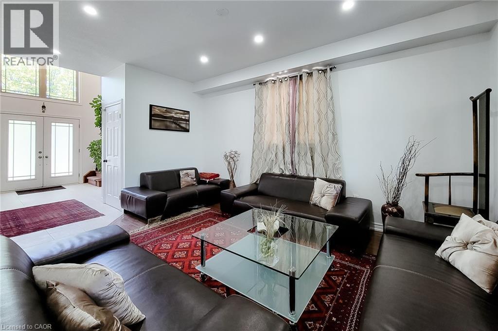 Spacious living area featuring recessed lighting and light-toned walls - 197 Cloverleaf Drive, Ancaster, ON - Indoor Photo Showing Living Room