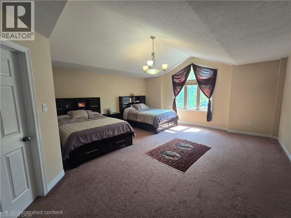 Spacious room featuring a vaulted ceiling and a prominent window - 197 Cloverleaf Drive, Ancaster, ON - Indoor Photo Showing Other Room