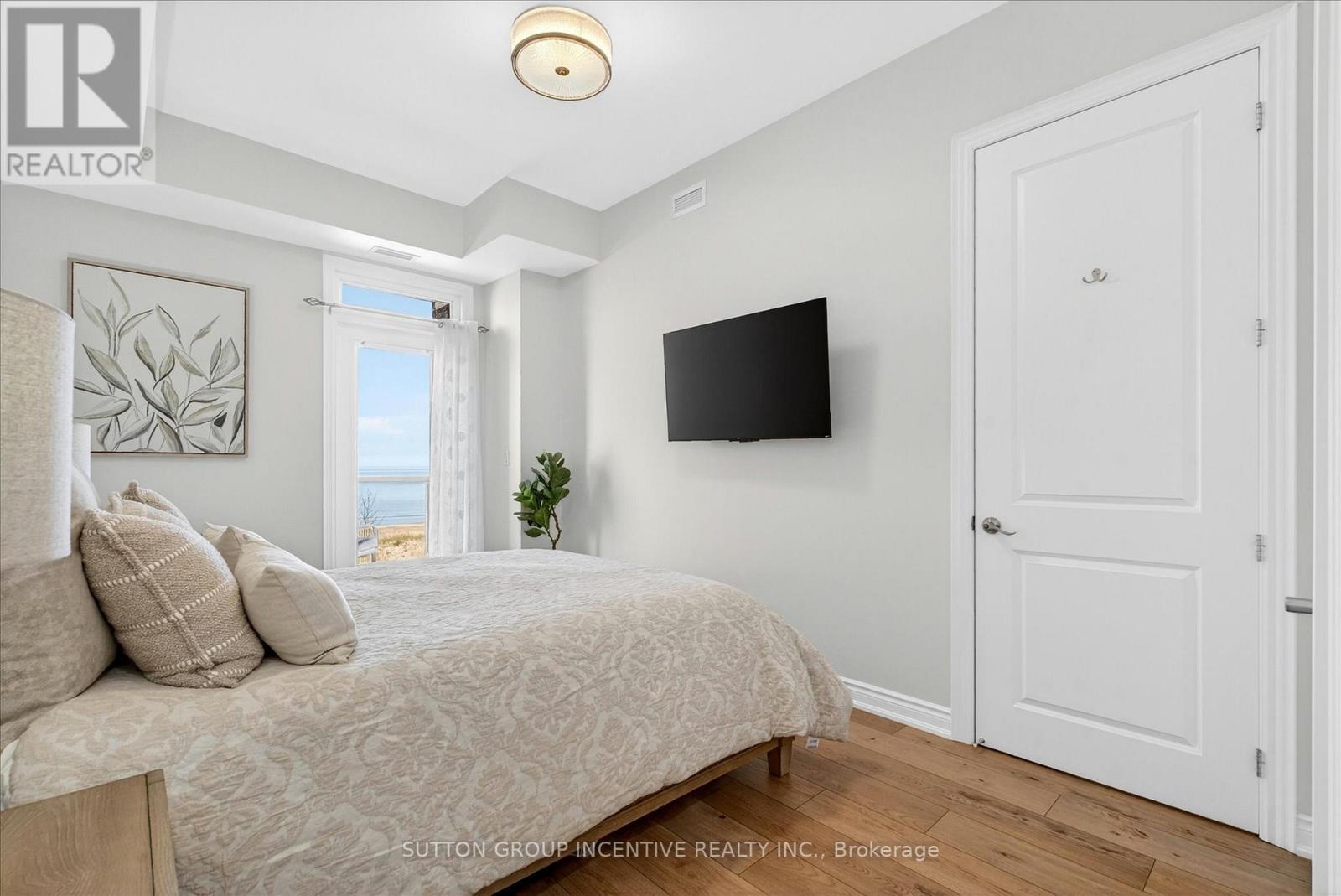 Primary Bedroom - 209 - 764 River Road E, Wasaga Beach, ON - Indoor Photo Showing Bedroom
