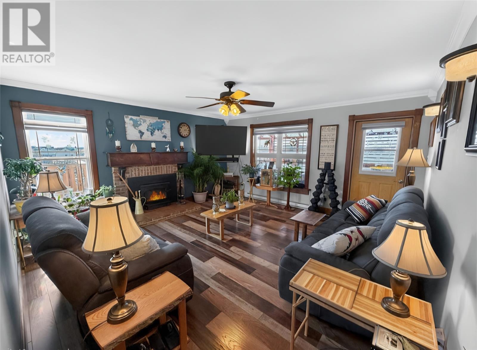 living room fireplace - 8, 8A, 10 Main Street, Twillingate, NL