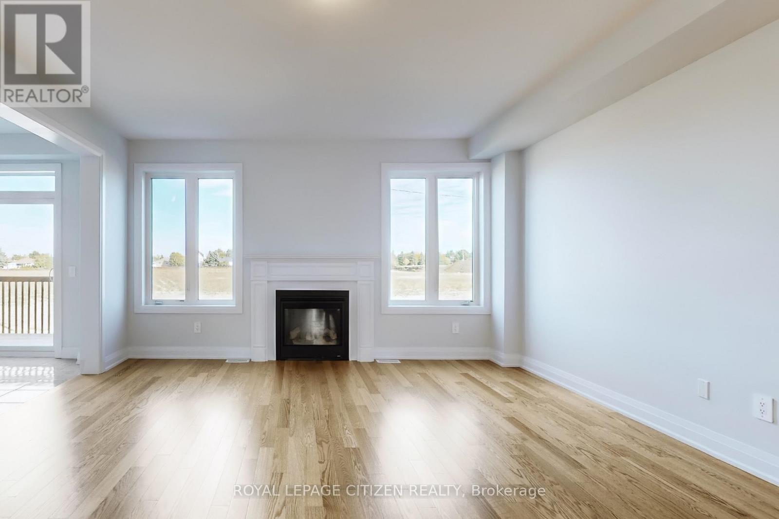 193 St. Joseph Road, Kawartha Lakes, ON - Indoor Photo Showing Living Room With Fireplace