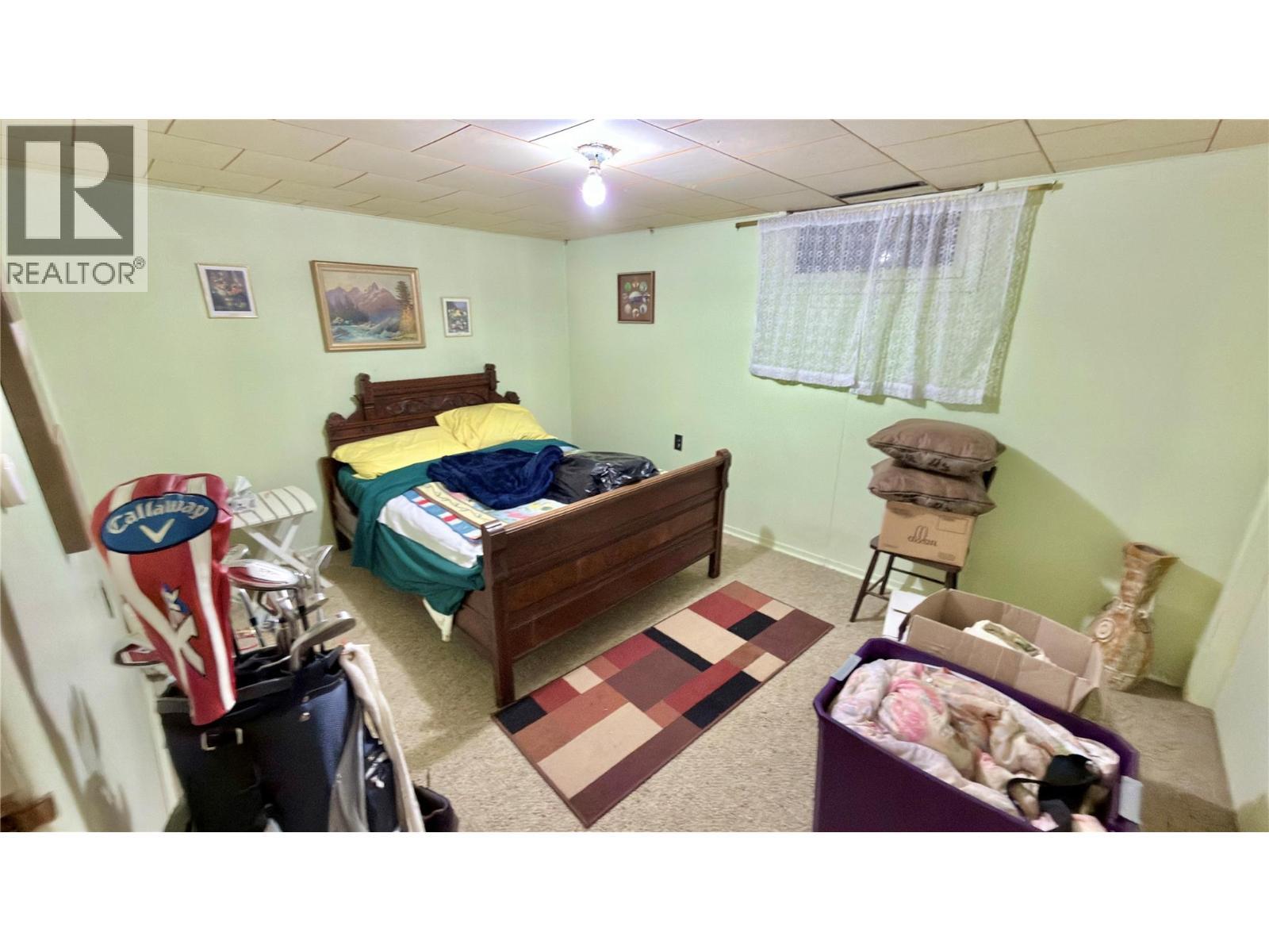 492 Fourth Avenue, Midway, BC - Indoor Photo Showing Bedroom