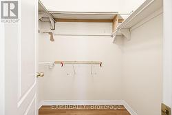 walk-in closet in primary bedroom - 