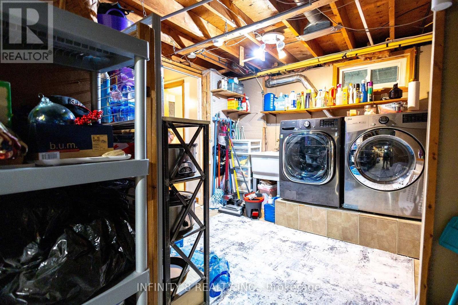 Basement Laundry Area - 38 Crescentwood Drive, St. Catharines (Lakeport), ON - Indoor Photo Showing Laundry Room