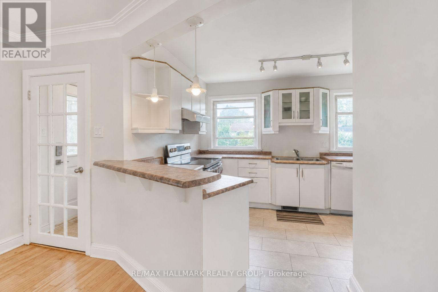 Virtually Decluttered - 223 Sanford Avenue, Ottawa, ON - Indoor Photo Showing Kitchen With Double Sink