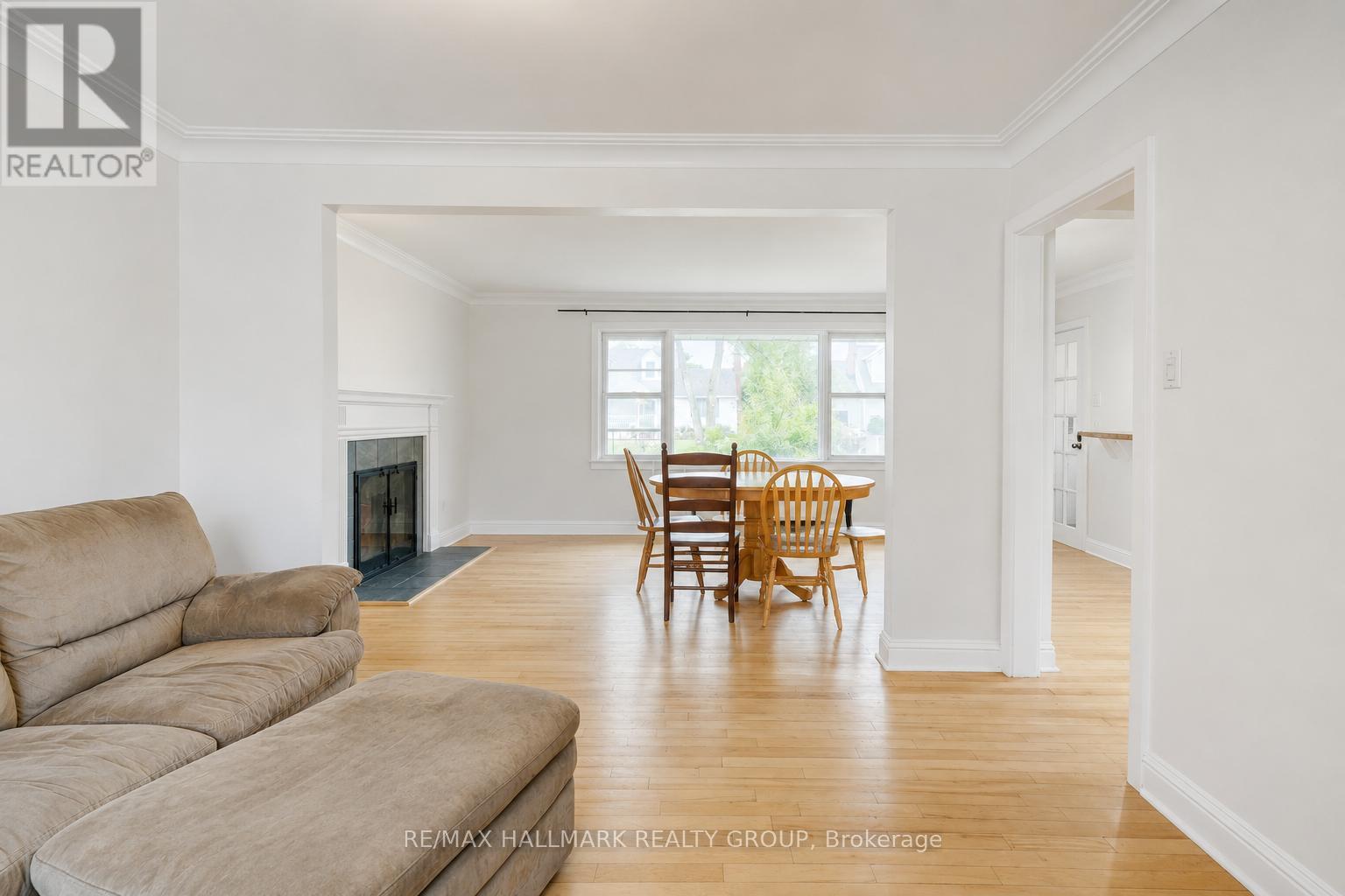 Virtually Decluttered - 223 Sanford Avenue, Ottawa, ON - Indoor Photo Showing Living Room With Fireplace