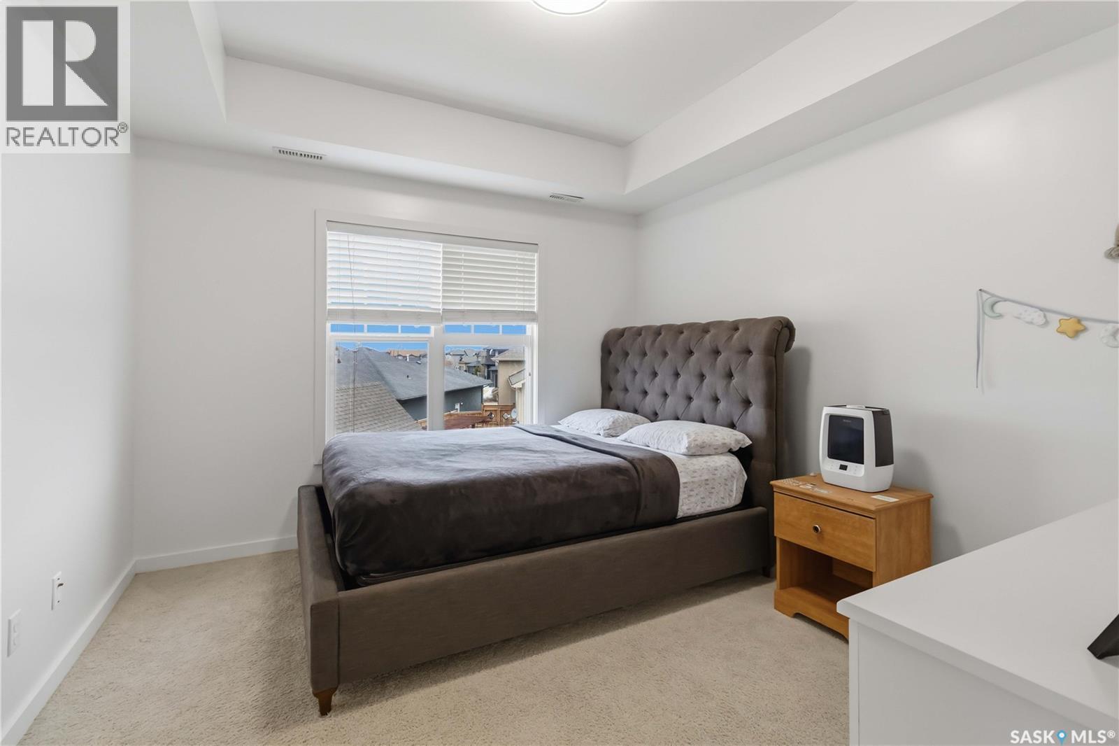 202 1015 Patrick Crescent, Saskatoon, SK - Indoor Photo Showing Bedroom