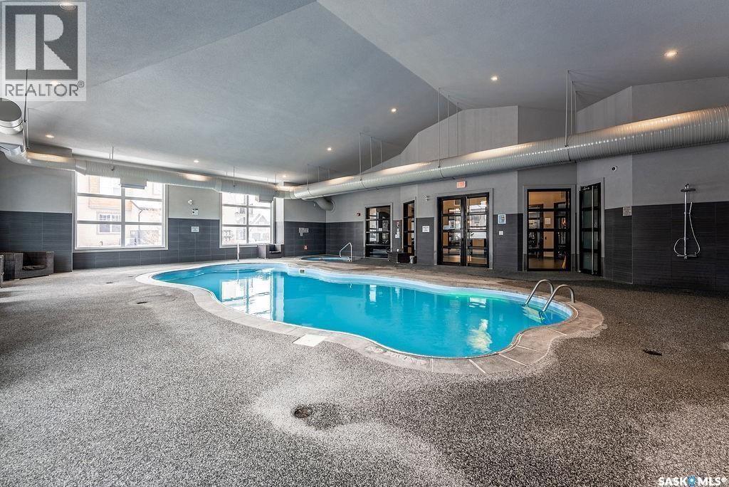 202 1015 Patrick Crescent, Saskatoon, SK - Indoor Photo Showing Other Room With In Ground Pool