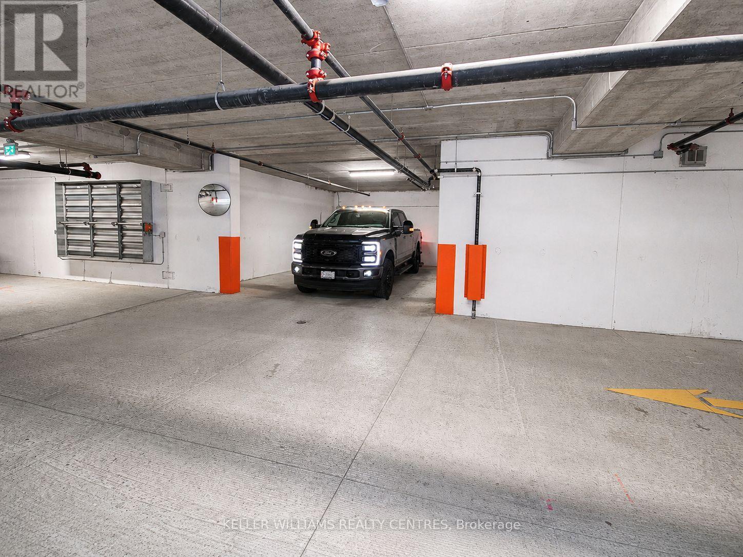 Large enough to accommodate a long-box truck - 1107 - 1880 Gordon Street, Guelph, ON - Indoor Photo Showing Garage