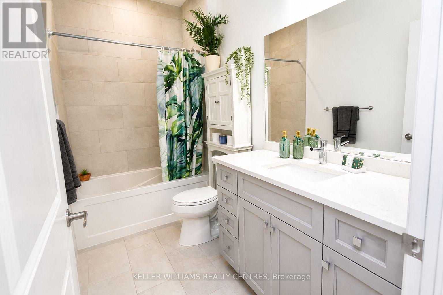Spa feel complete with heated floors - 1107 - 1880 Gordon Street, Guelph, ON - Indoor Photo Showing Bathroom