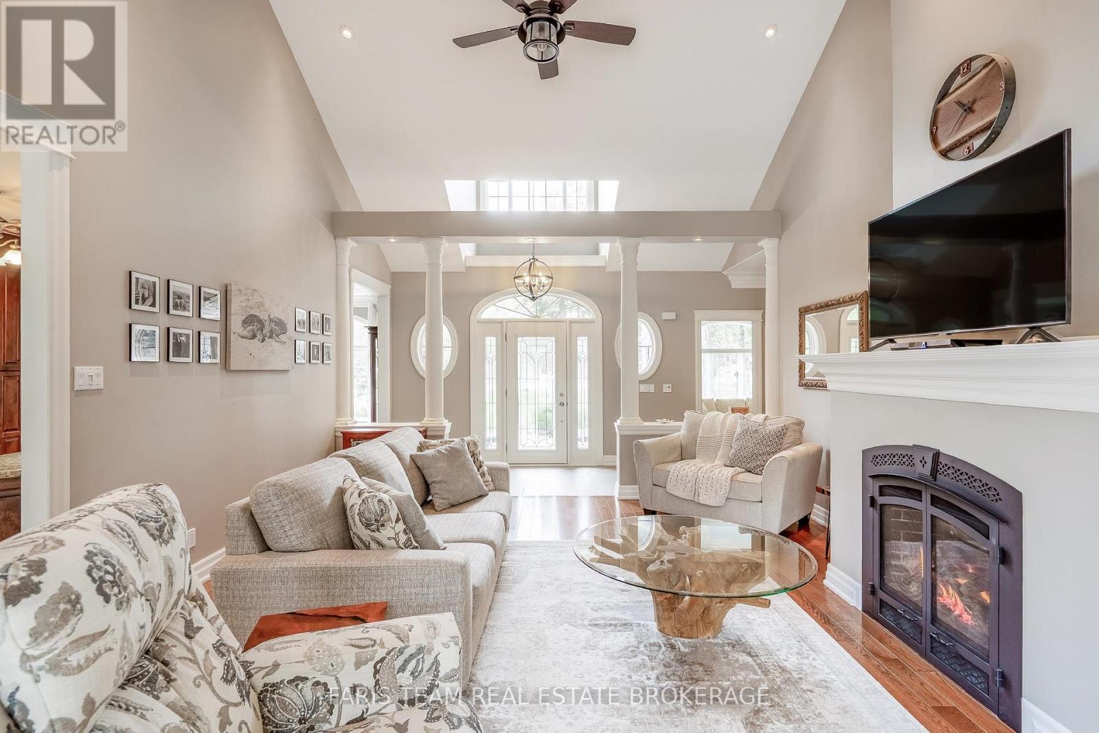 20 Mourning Dove Trail, Tiny, ON - Indoor Photo Showing Living Room With Fireplace