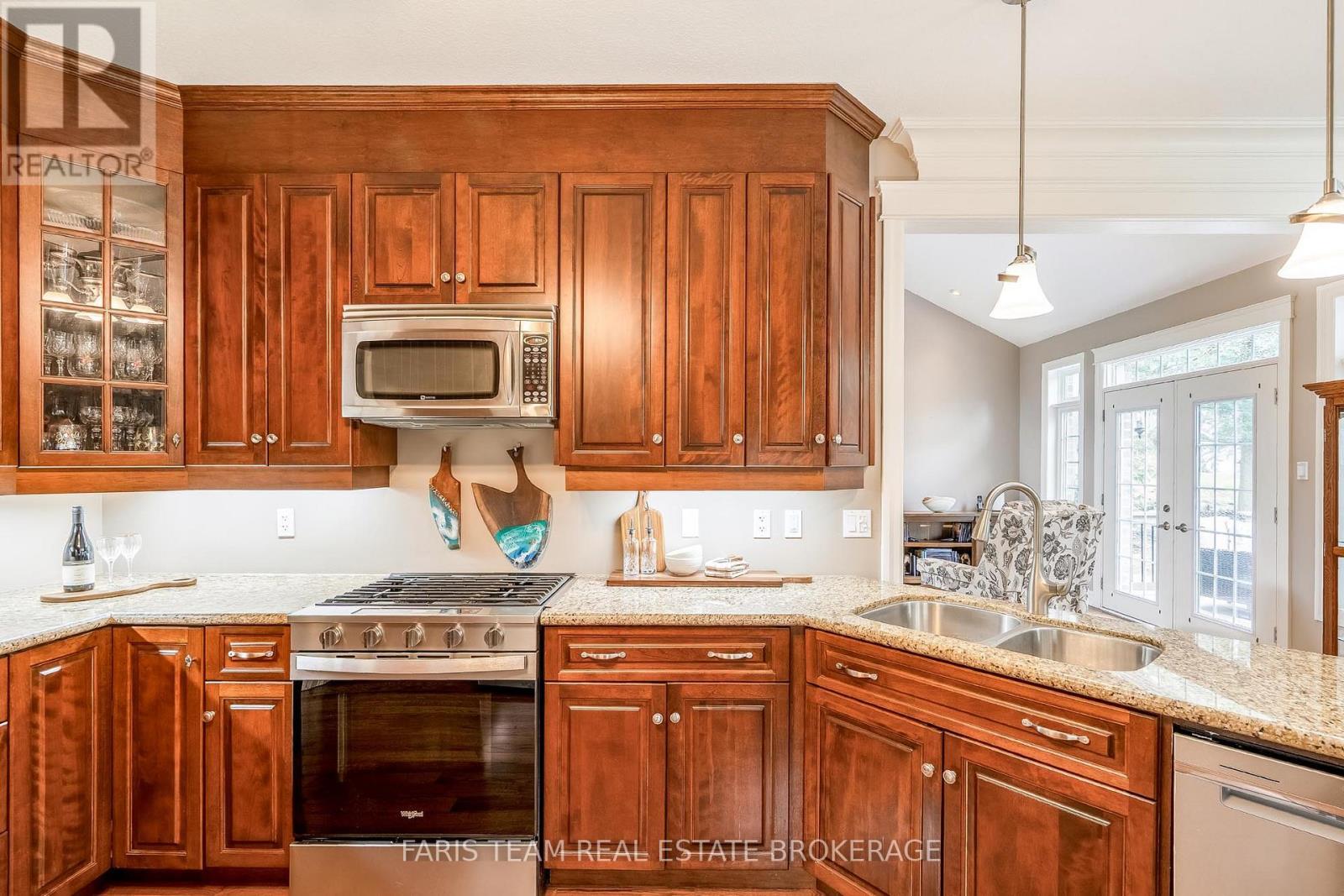 20 Mourning Dove Trail, Tiny, ON - Indoor Photo Showing Kitchen With Double Sink