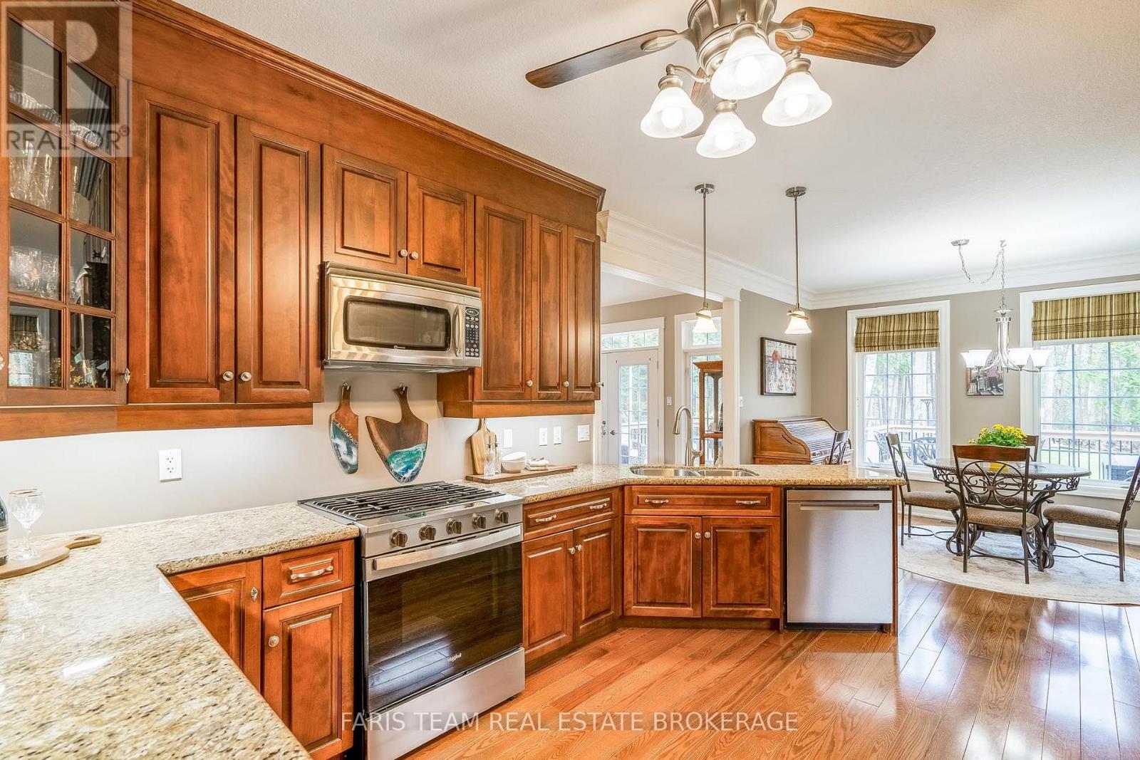20 Mourning Dove Trail, Tiny, ON - Indoor Photo Showing Kitchen With Double Sink