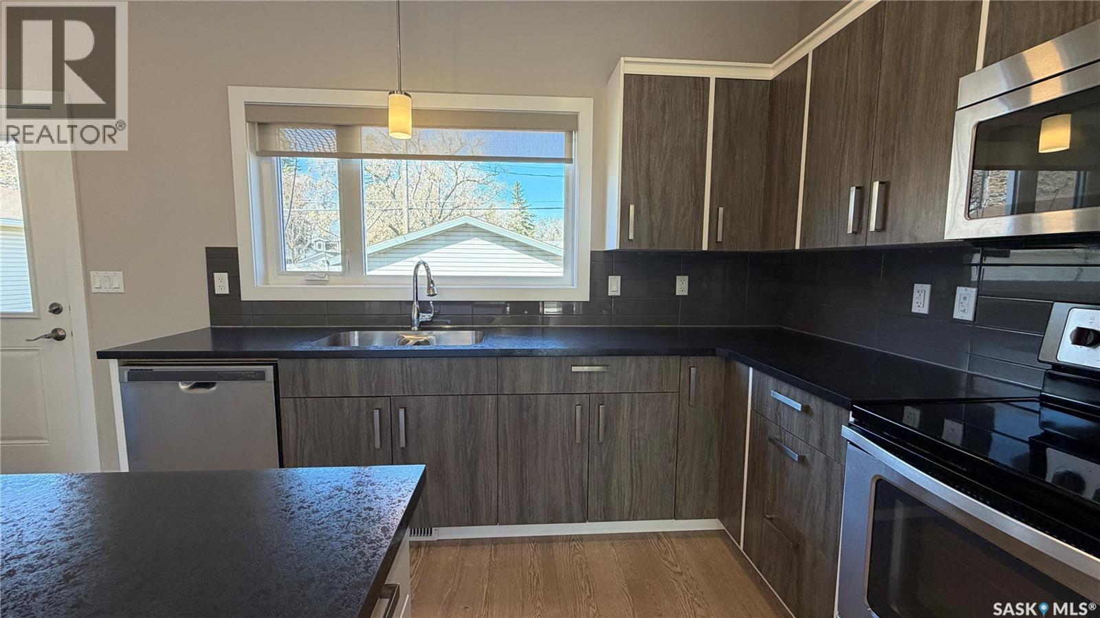 2212 St Patrick Avenue, Saskatoon, SK - Indoor Photo Showing Kitchen With Double Sink