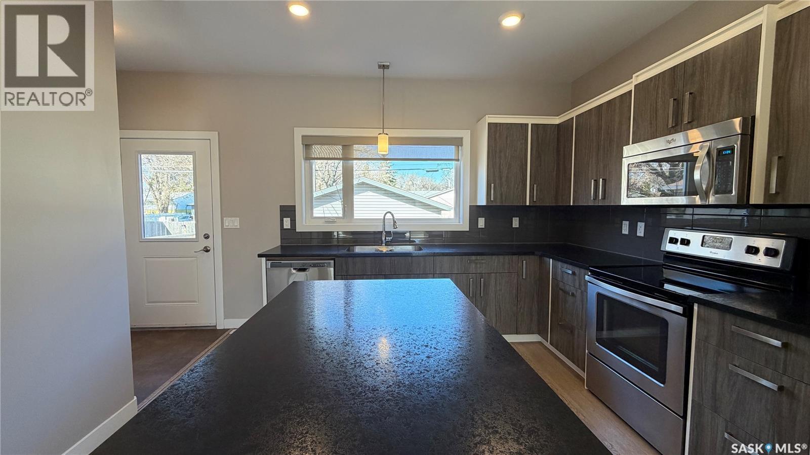 2212 St Patrick Avenue, Saskatoon, SK - Indoor Photo Showing Kitchen With Double Sink