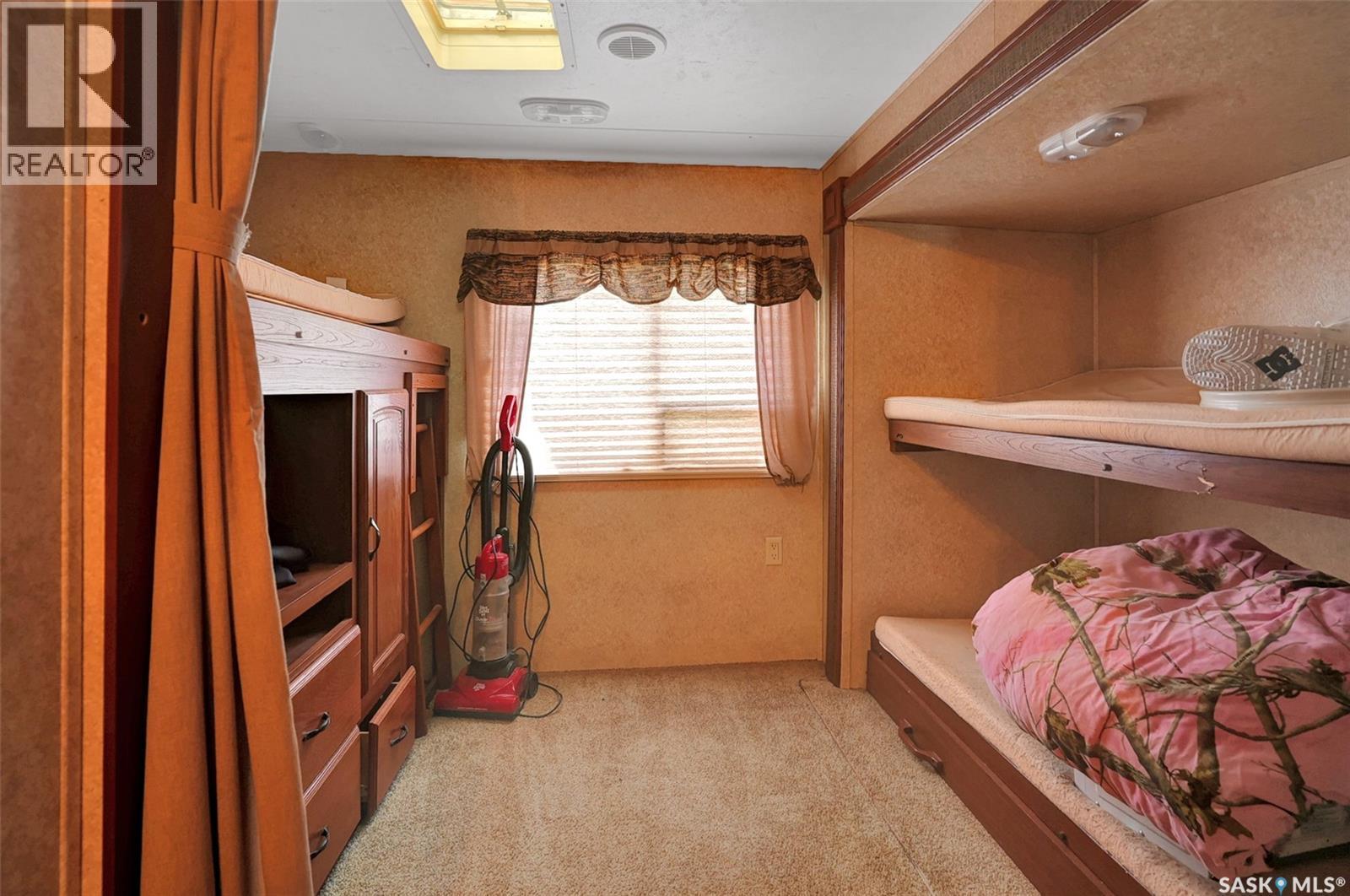 1202 Tatanka Drive, Sun Valley, SK - Indoor Photo Showing Bedroom