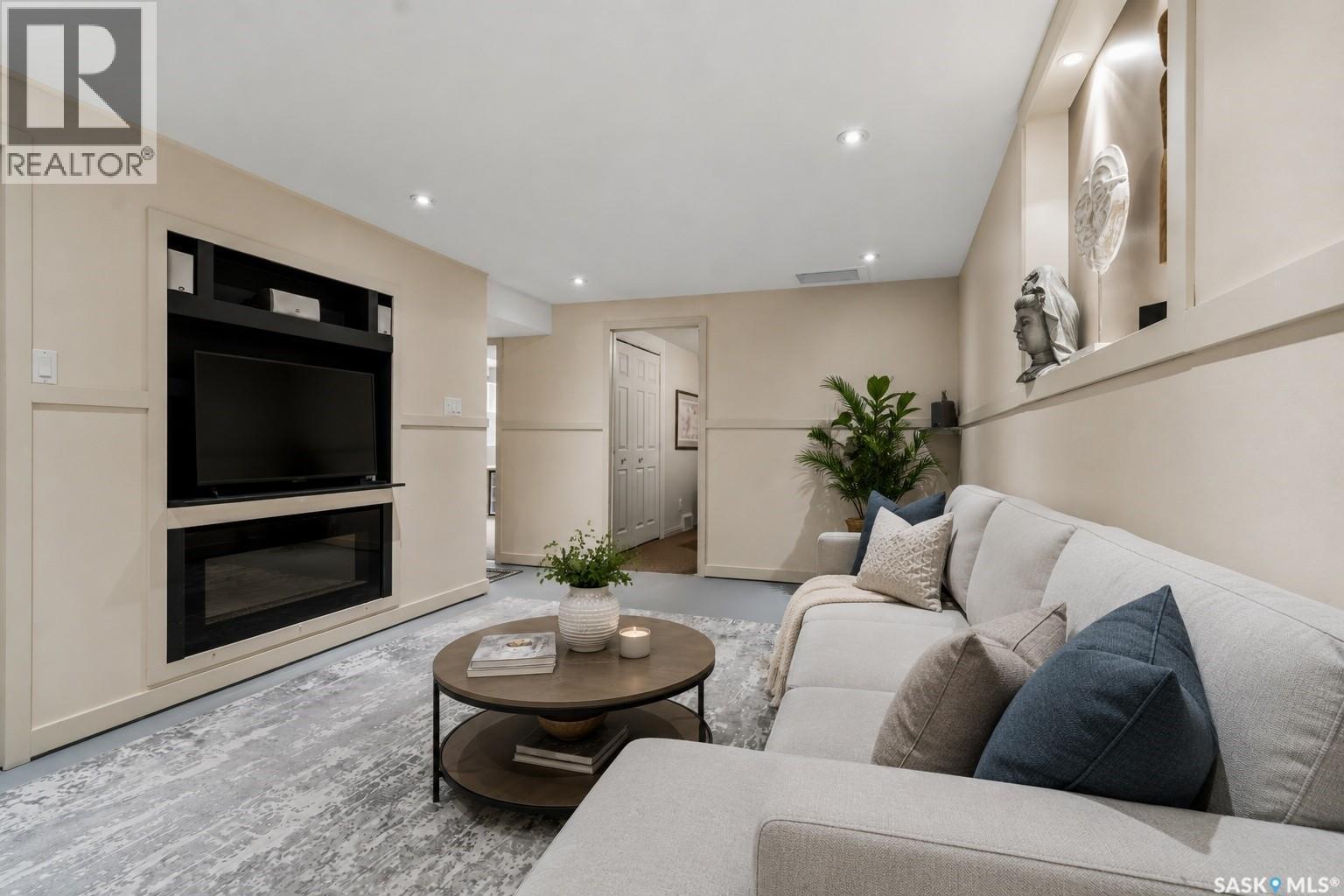 6 Selkirk Crescent, Regina, SK - Indoor Photo Showing Living Room With Fireplace