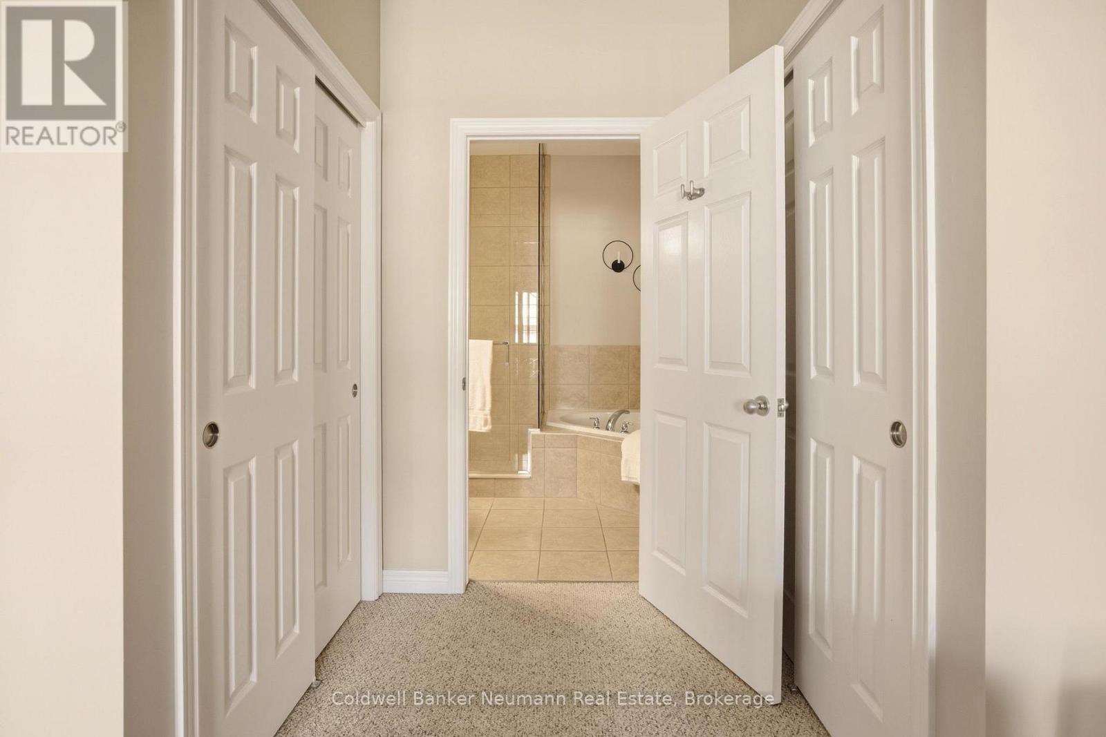 Dual Primary Closets - 21 - 50 Bryan Court, Kitchener, ON - Indoor Photo Showing Other Room
