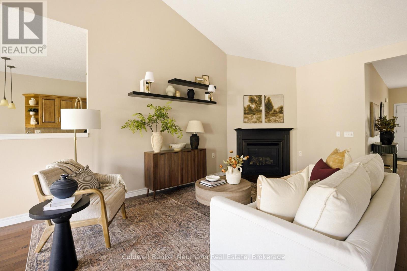 Living Room with Fireplace - 21 - 50 Bryan Court, Kitchener, ON - Indoor Photo Showing Living Room With Fireplace