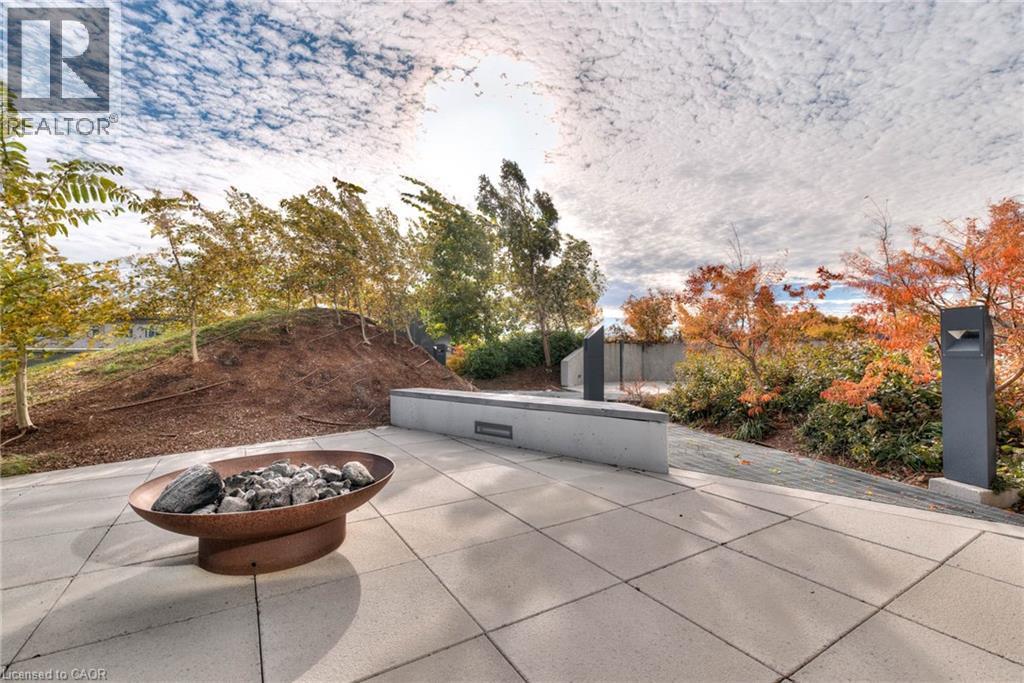 Shared patio / terrace with a fire pit - 50 Grand Avenue S Unit# 602, Cambridge, ON - Outdoor