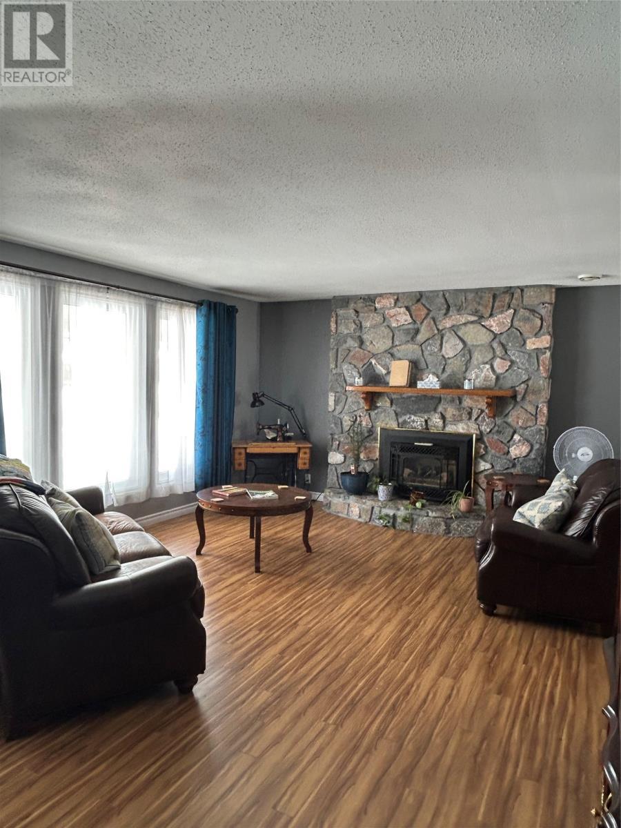 13 Birchview Drive, Pasadena, NL - Indoor Photo Showing Living Room With Fireplace