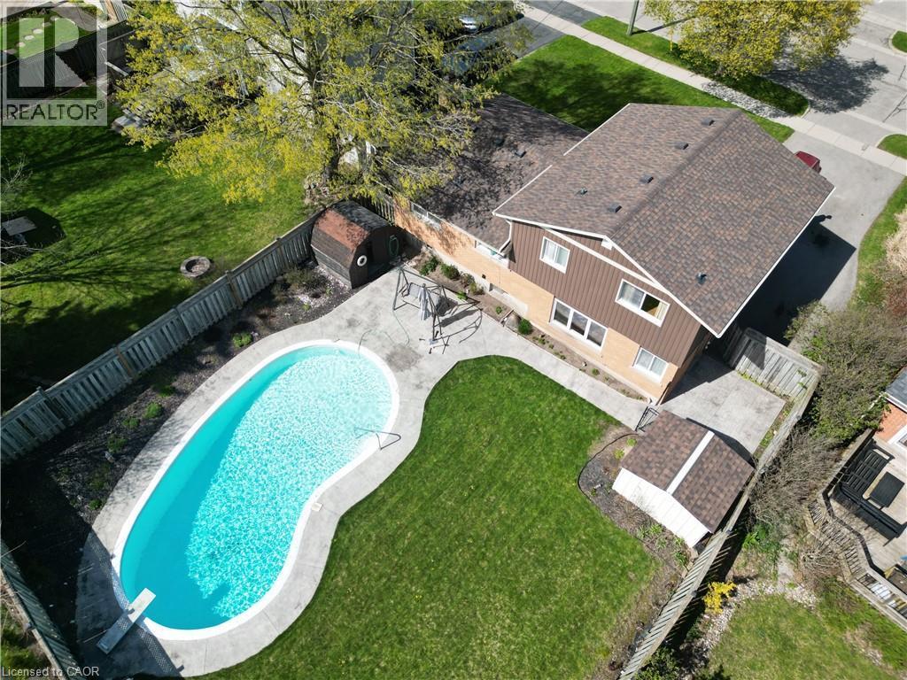 Areal view of house with inground tiled Gunite pool - 76 Cloverdale Crescent, Kitchener, ON - Outdoor With In Ground Pool