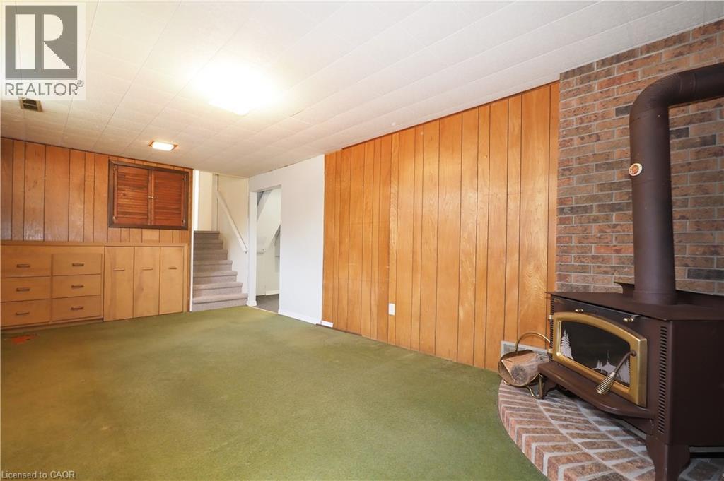 Basement recreation room with view of deep pull out storage cabinetry - 76 Cloverdale Crescent, Kitchener, ON - Indoor Photo Showing Other Room