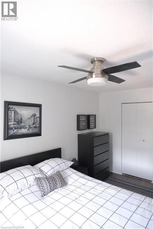 Recessed lighting and ceiling fan with integrated light fixture - 175 Hunter Street E Unit# 301, Hamilton, ON - Indoor Photo Showing Bedroom
