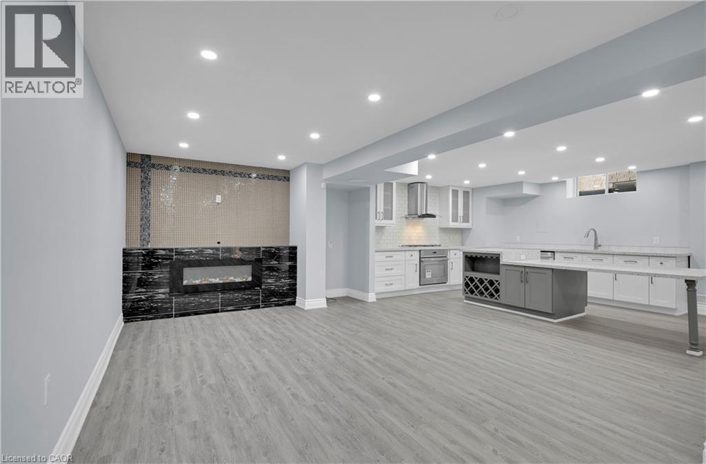 7 Riesling Court, Hamilton, ON - Indoor With Fireplace
