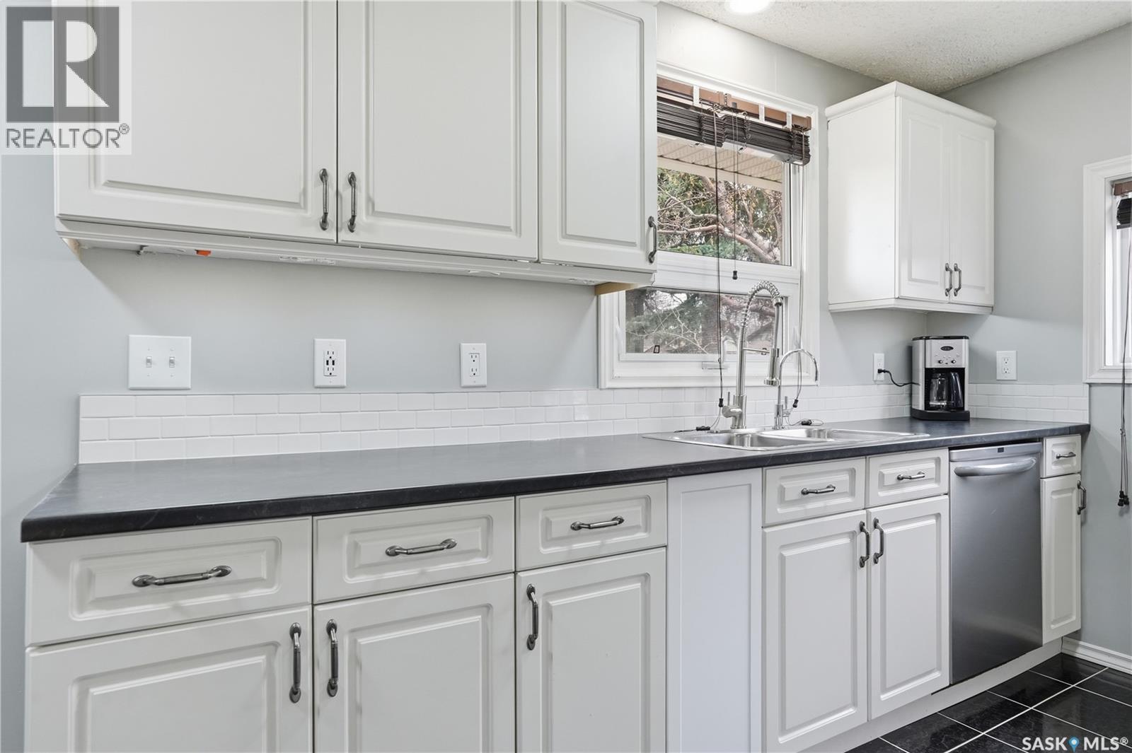 1630 1St Avenue N, Regina, SK - Indoor Photo Showing Kitchen With Double Sink