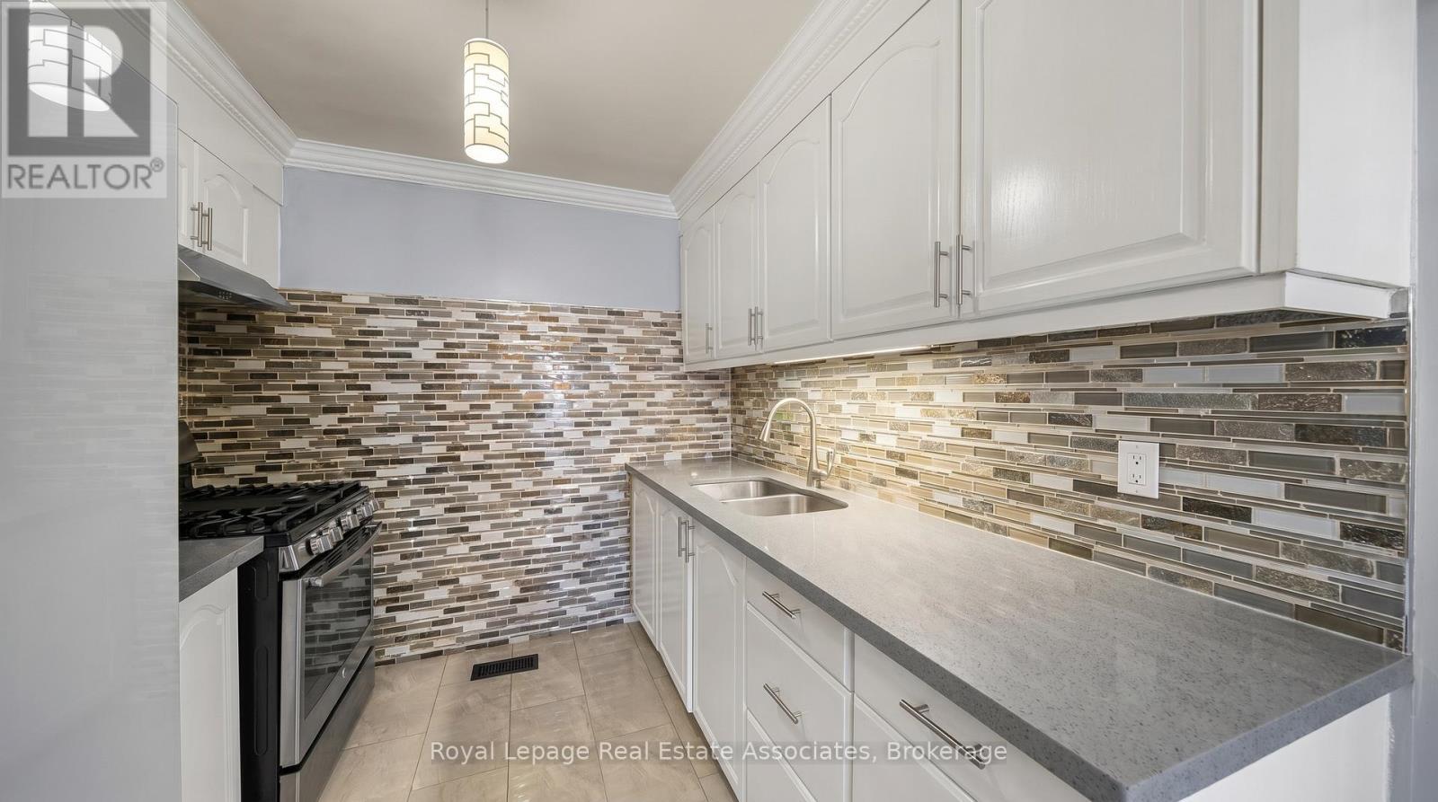 95 Quantrell Trail, Toronto, ON - Indoor Photo Showing Kitchen With Double Sink