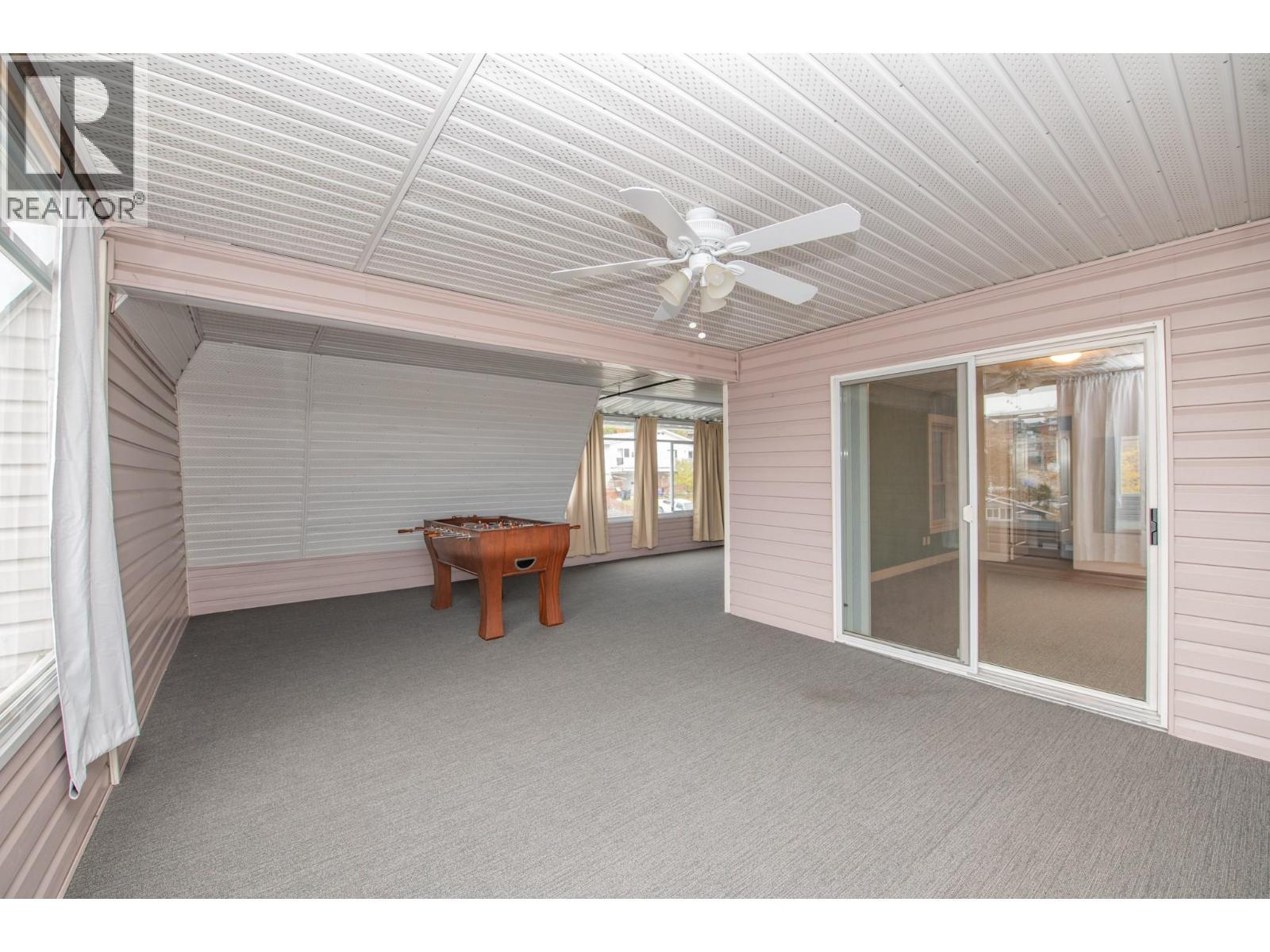 Enclosed patio/deck for games room, extra space for entertaining guests - 3929 22 Avenue Unit# 309, Vernon, BC - Outdoor With Exterior