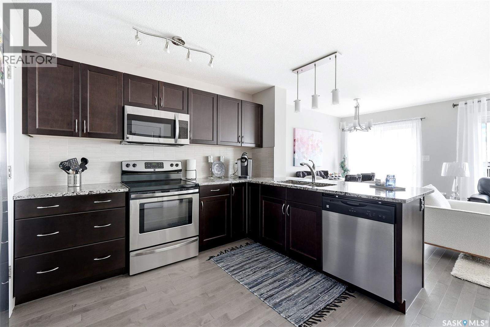 8849 Kestral Drive, Regina, SK - Indoor Photo Showing Kitchen With Upgraded Kitchen