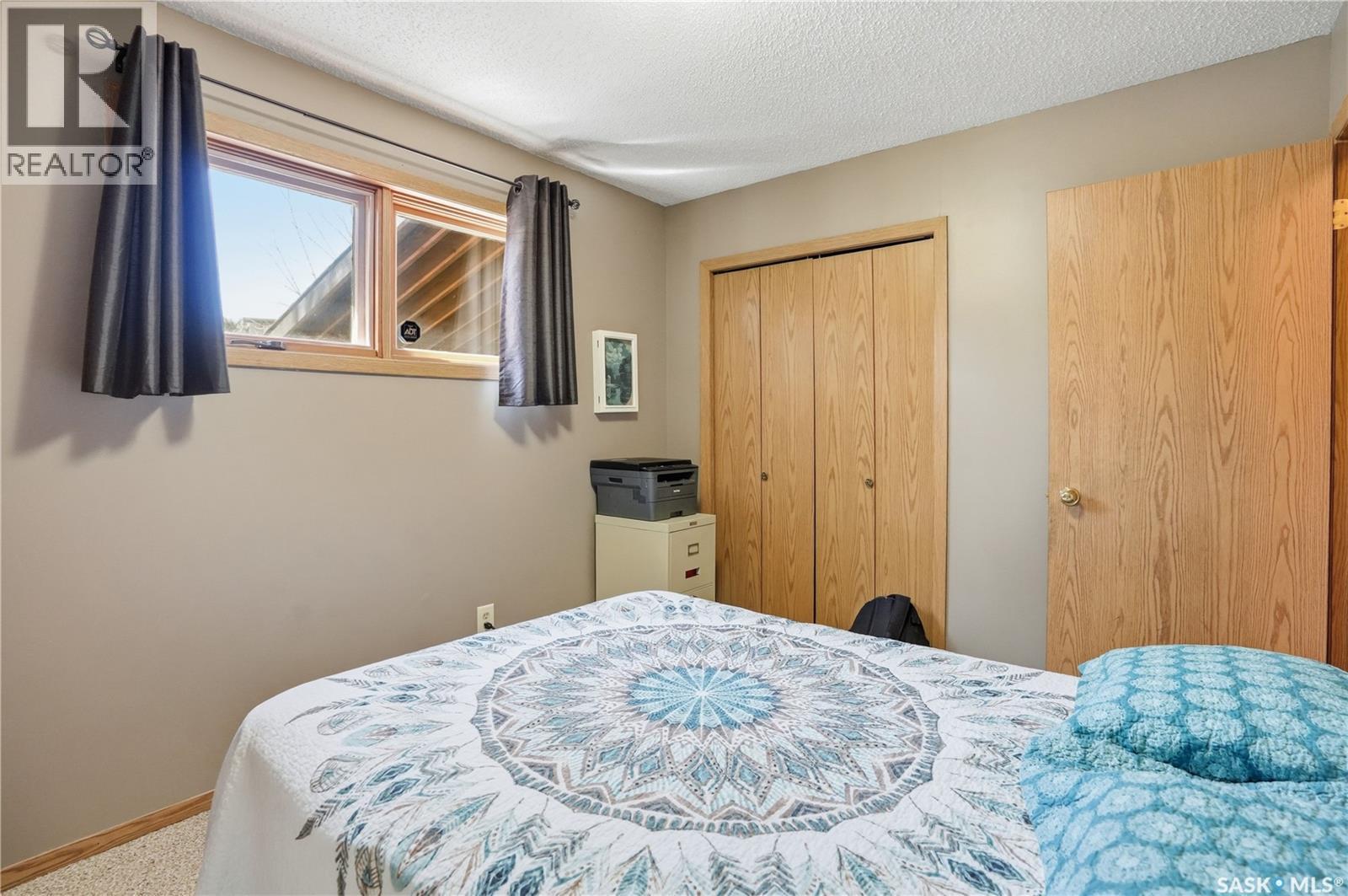 2835 More Crescent E, Regina, SK - Indoor Photo Showing Bedroom