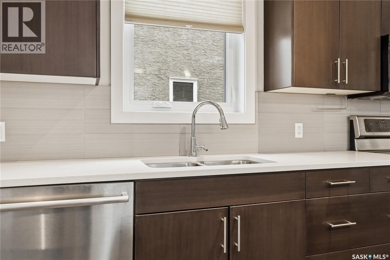8806 Barootes Way, Regina, SK - Indoor Photo Showing Kitchen With Double Sink