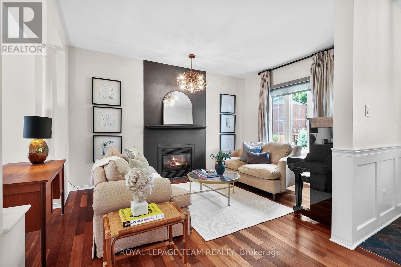 2122 Saunders Avenue, Ottawa, ON - Indoor Photo Showing Living Room With Fireplace