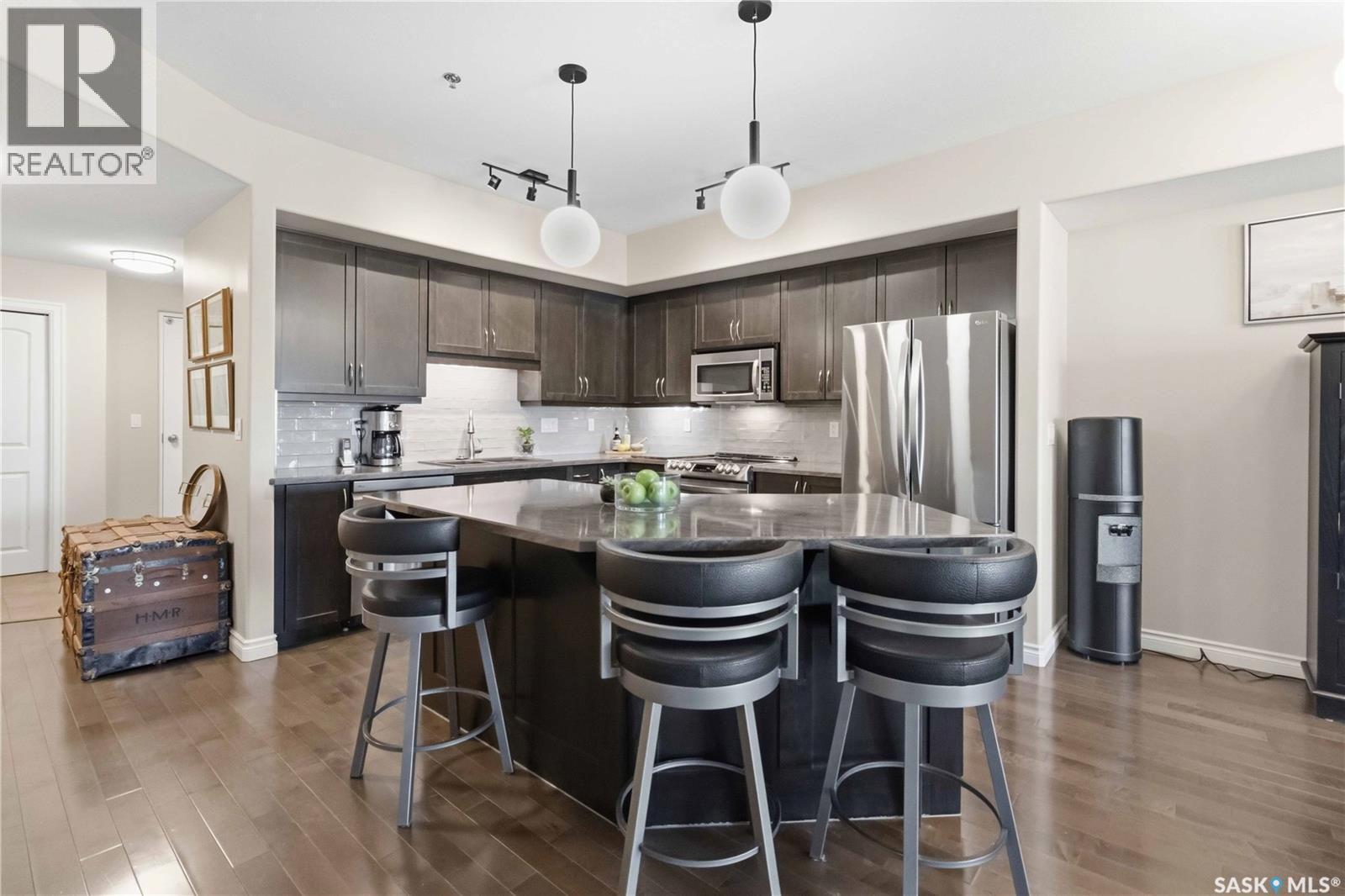 204 227 Pinehouse Drive, Saskatoon, SK - Indoor Photo Showing Kitchen With Upgraded Kitchen