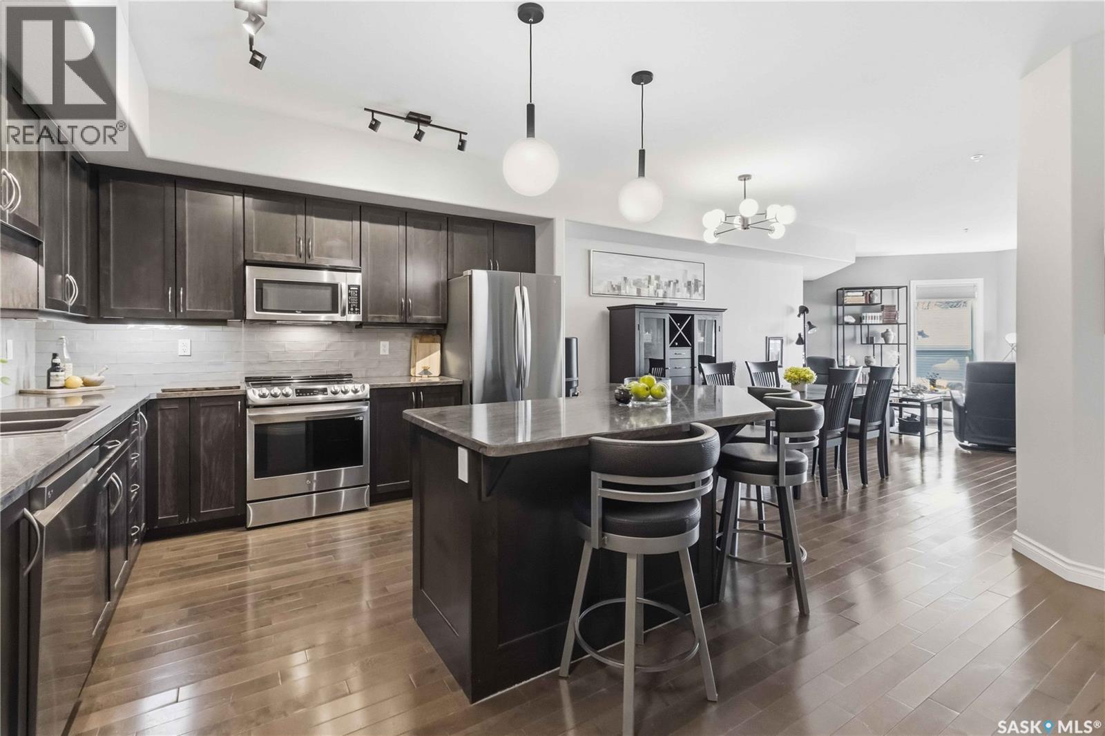 204 227 Pinehouse Drive, Saskatoon, SK - Indoor Photo Showing Kitchen With Upgraded Kitchen