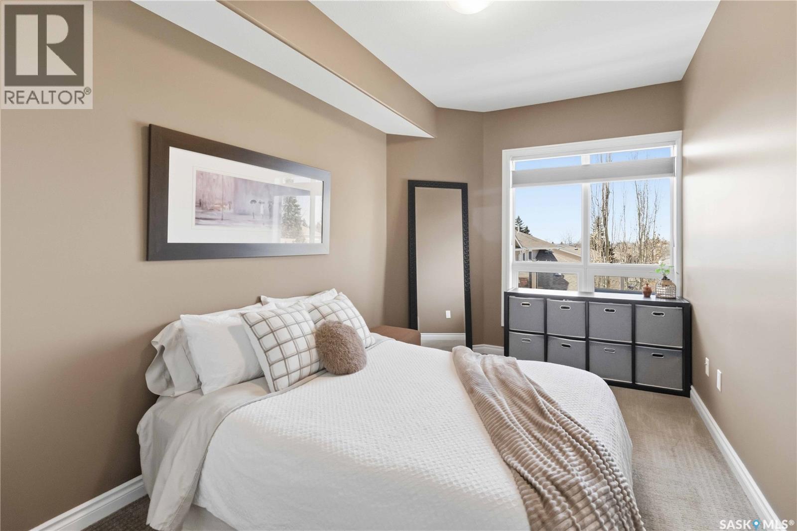 204 227 Pinehouse Drive, Saskatoon, SK - Indoor Photo Showing Bedroom