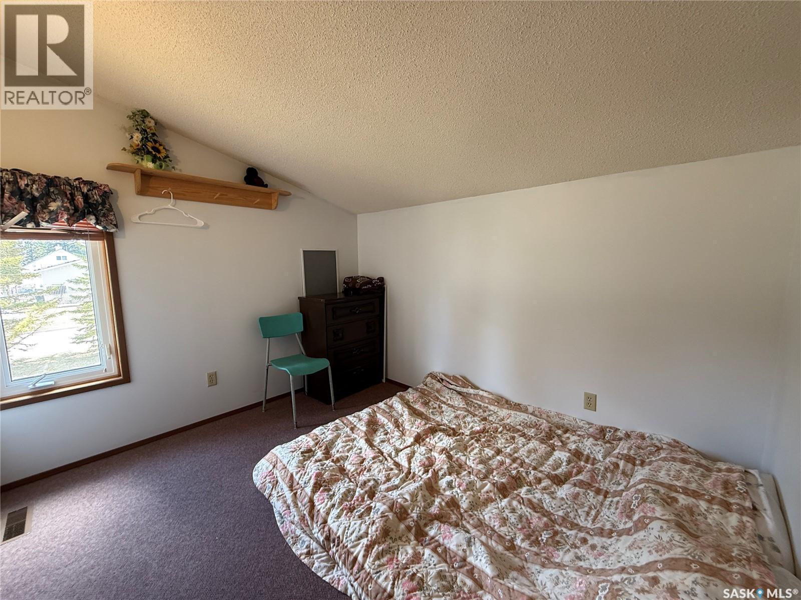 117 3Rd Avenue Nw, Watson, SK - Indoor Photo Showing Bedroom