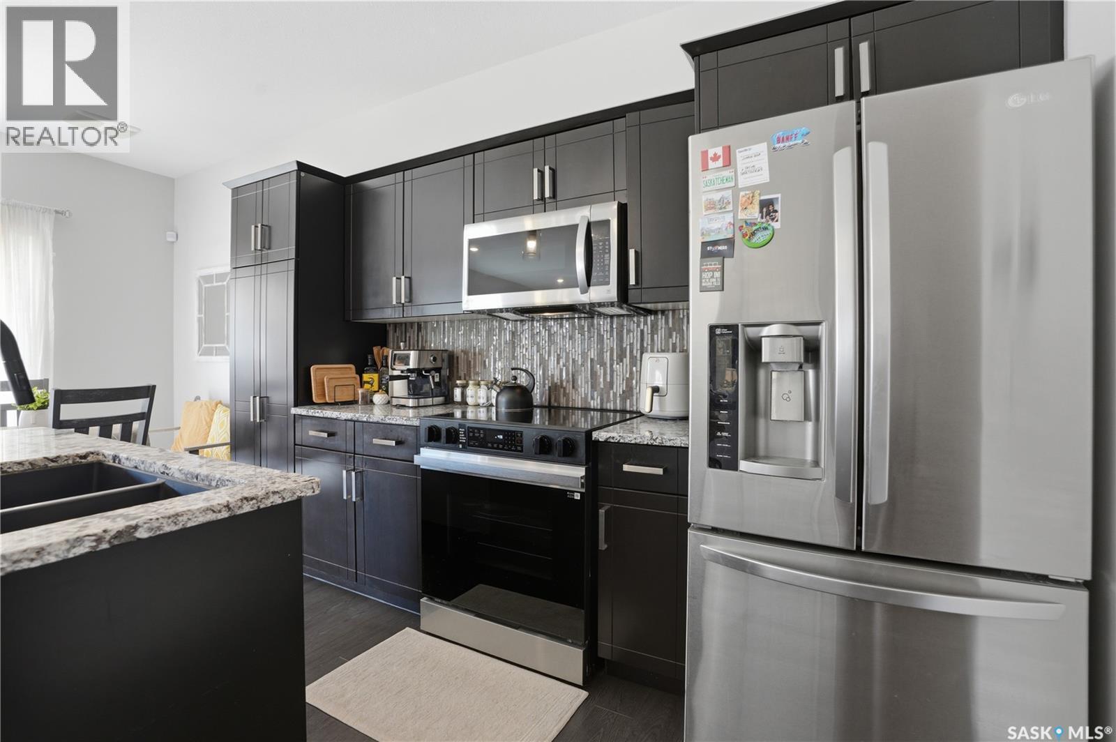 739 150 Langlois Way, Saskatoon, SK - Indoor Photo Showing Kitchen With Double Sink With Upgraded Kitchen
