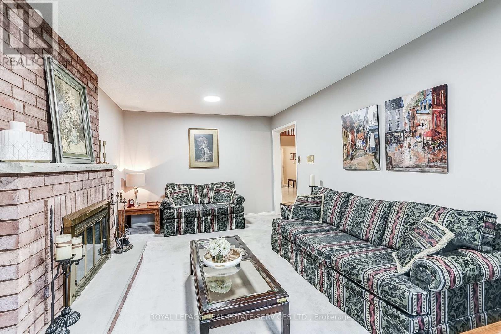 4217 Schneider Court, Mississauga, ON - Indoor Photo Showing Living Room With Fireplace