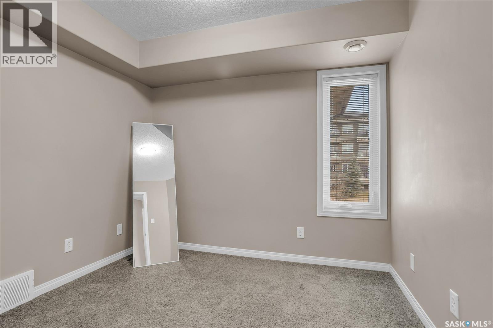 128 125 Willis Crescent, Saskatoon, SK - Indoor Photo Showing Other Room